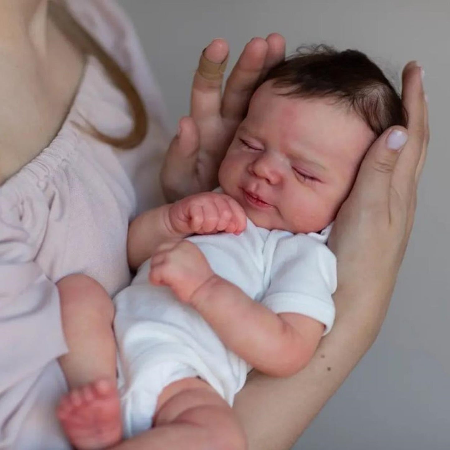19inch Implanted Hair Reborn Baby Doll with Closed Eyes