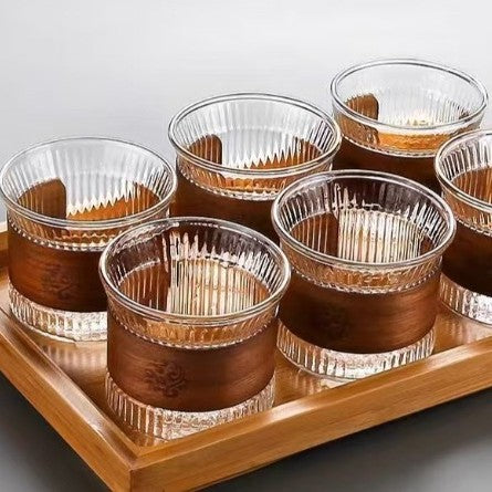 A high borosilicate teapot for brewing tea around a stove