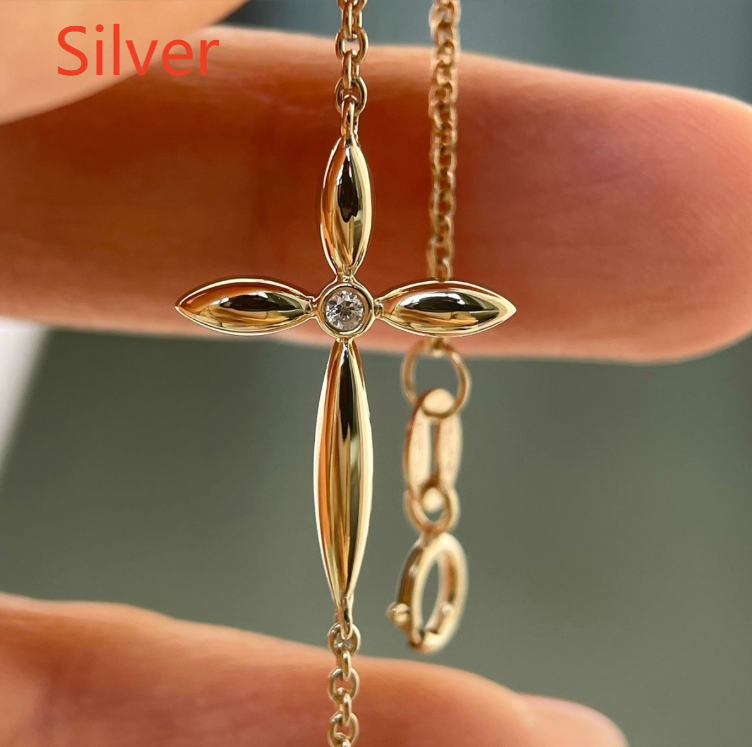 Adjustable Sterling Silver Cross Bracelet with Gold Plating