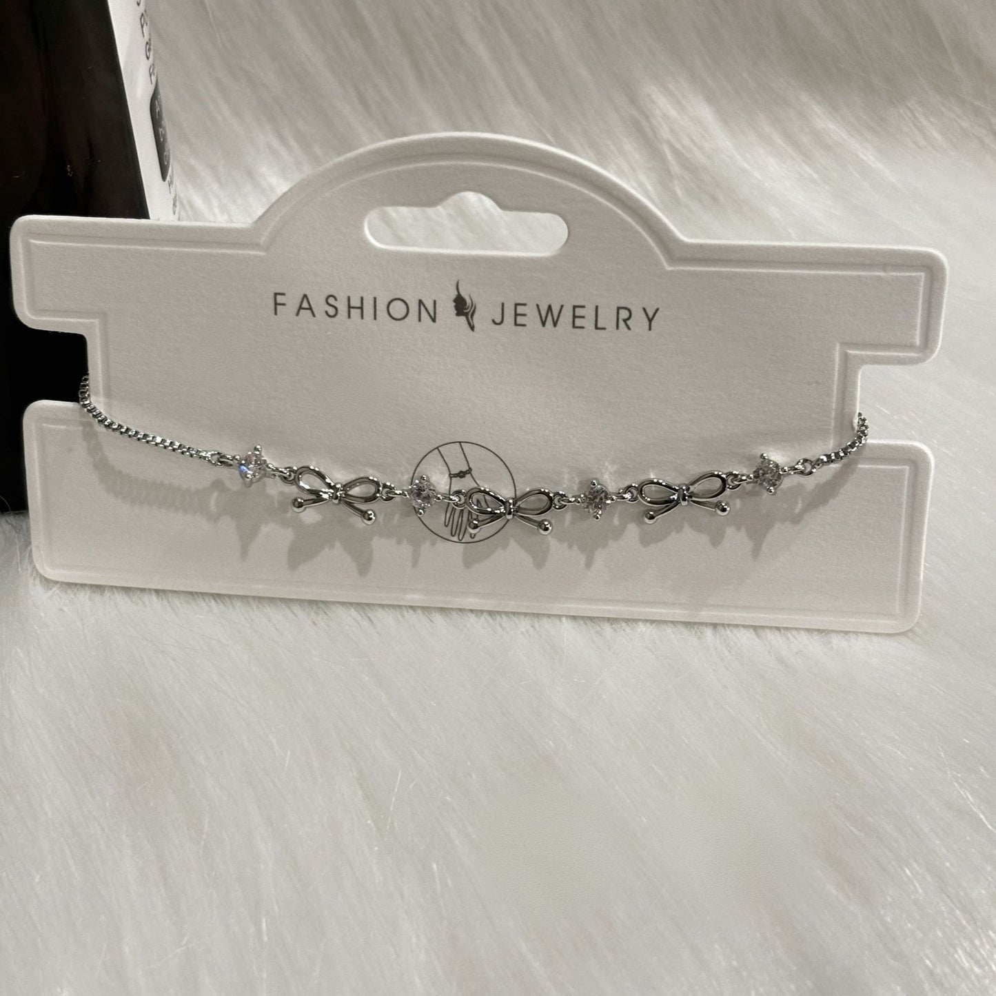Bow Design Titanium Steel Bracelet with Geometric Pendant