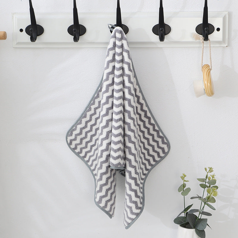 Cationic high density warp knitted coral fleece towel
