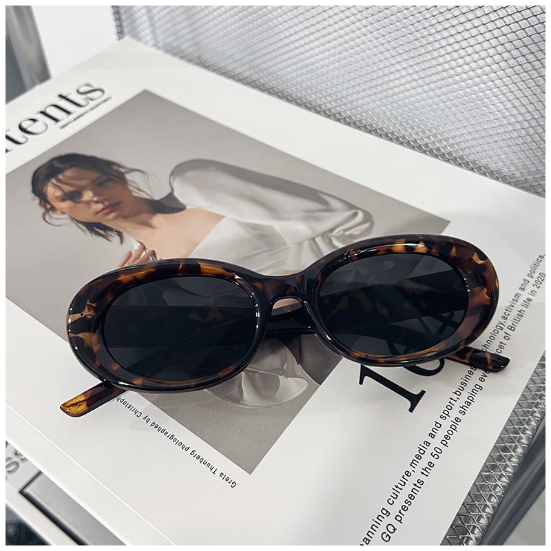 Curved-shaped sunglasses