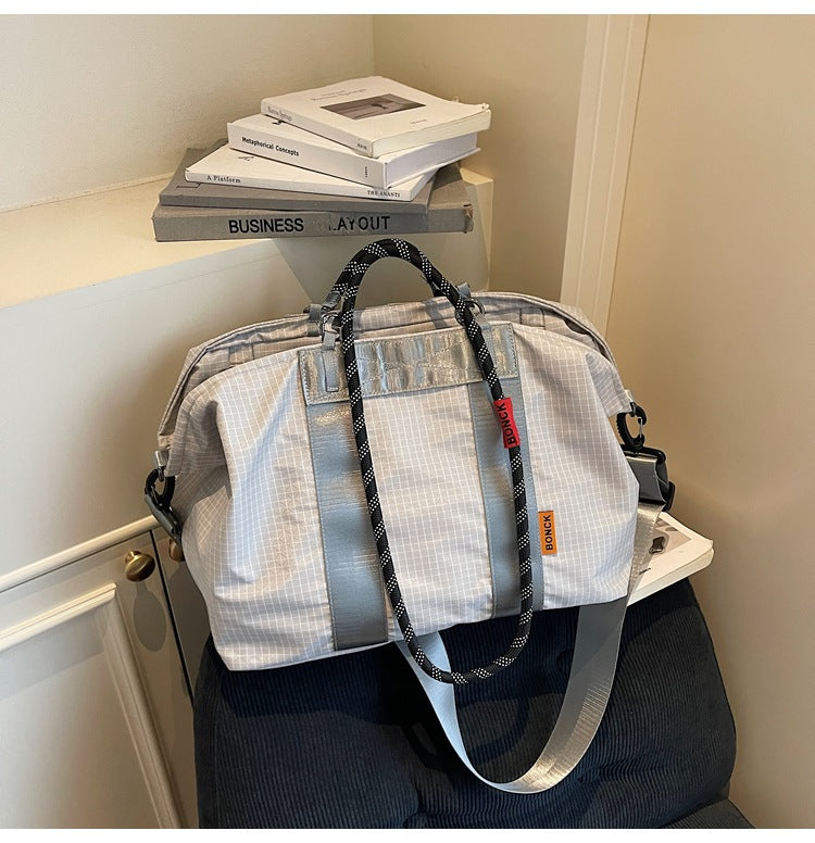 Handheld crossbody travel bag
