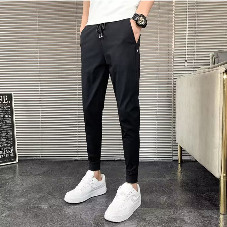 Hipster-style distressed ink-stained jeans