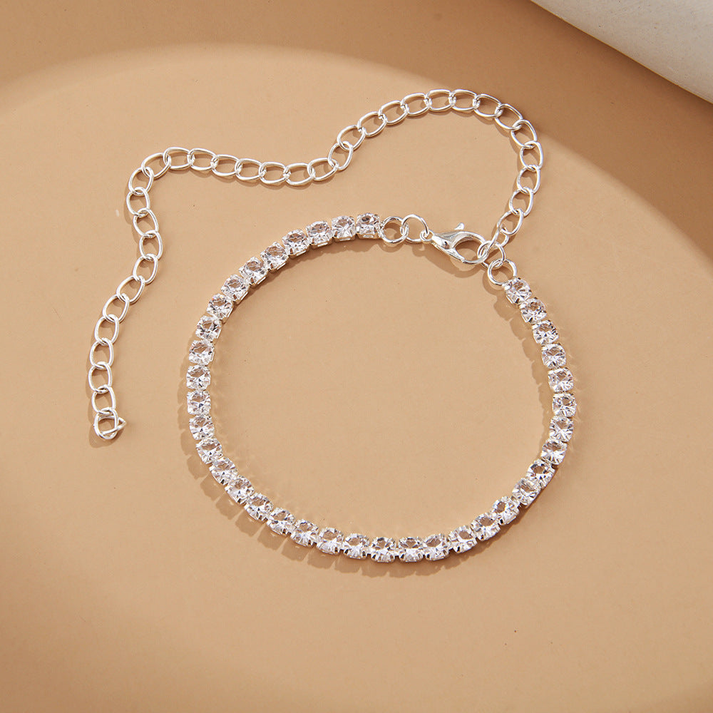 Shining natural diamonds the necklace on the foot