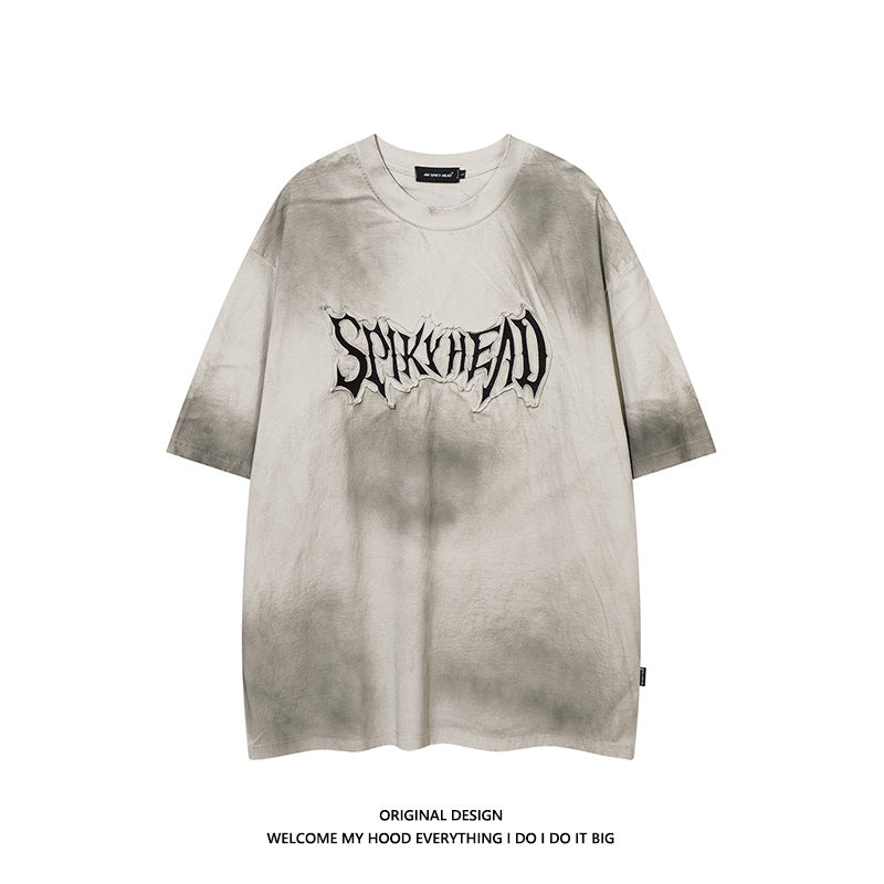 Short-sleeved T-shirt with stained patches