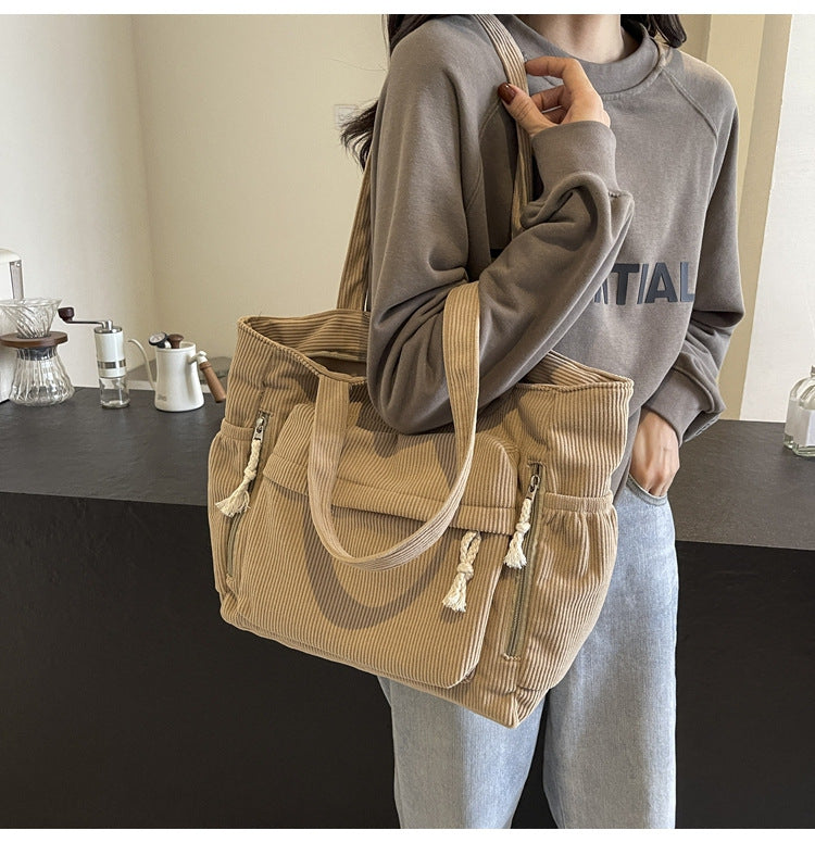Simple corduroy tote bag for women, large capacity, suitable for daily commuting.