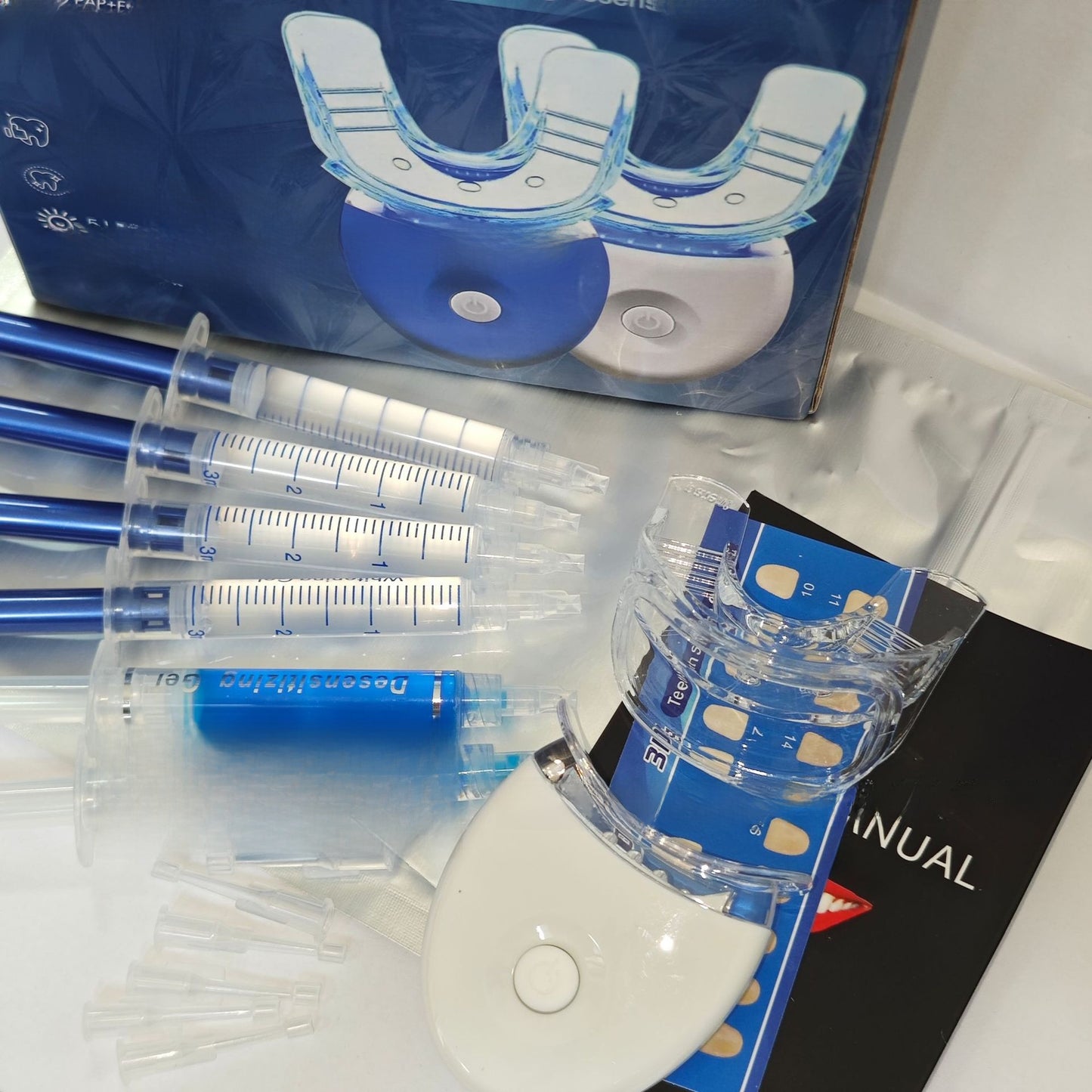 Teeth-whitening serum with a teeth-lighting lamp