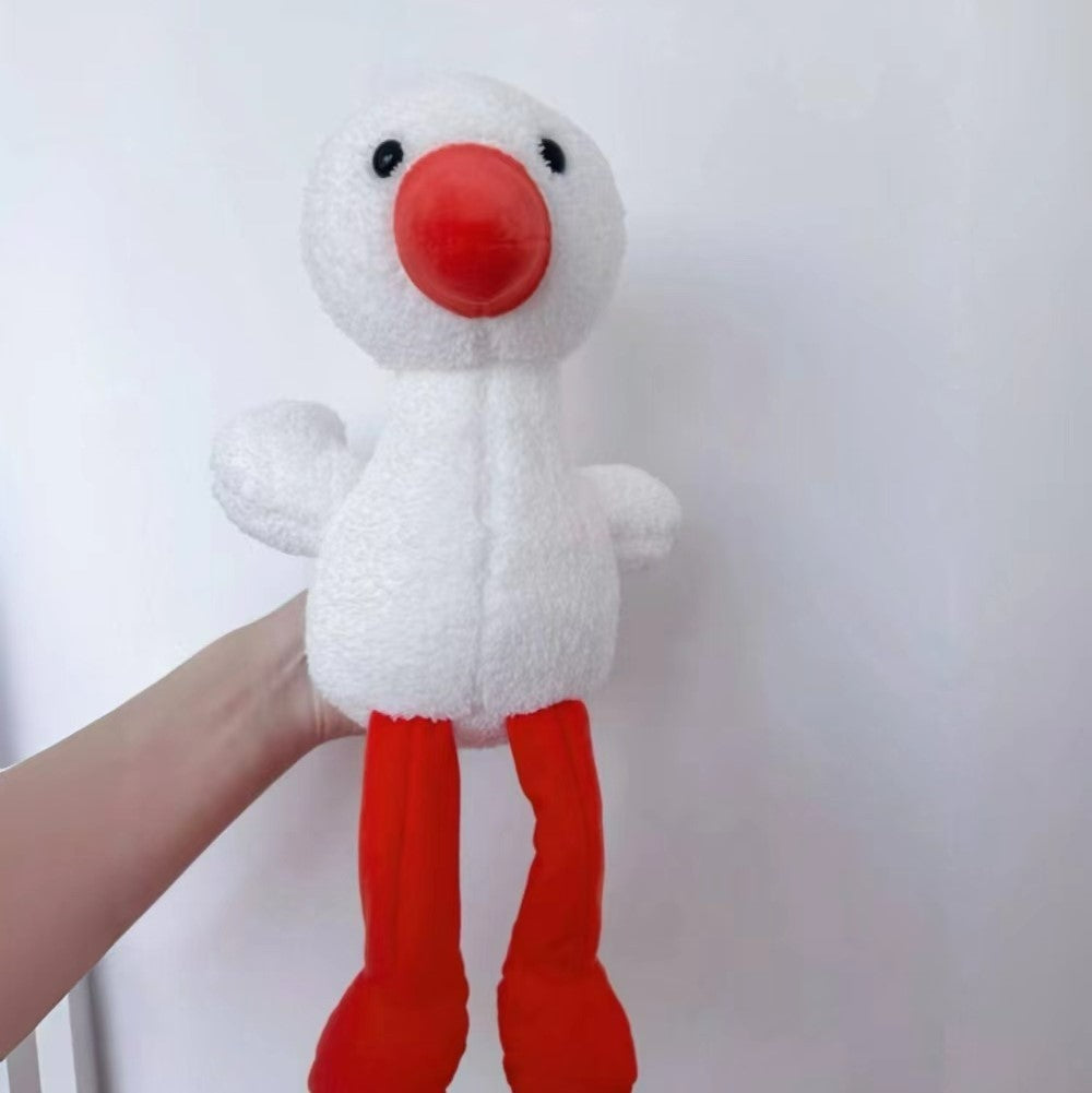The cute frog soothes the stuffed toy