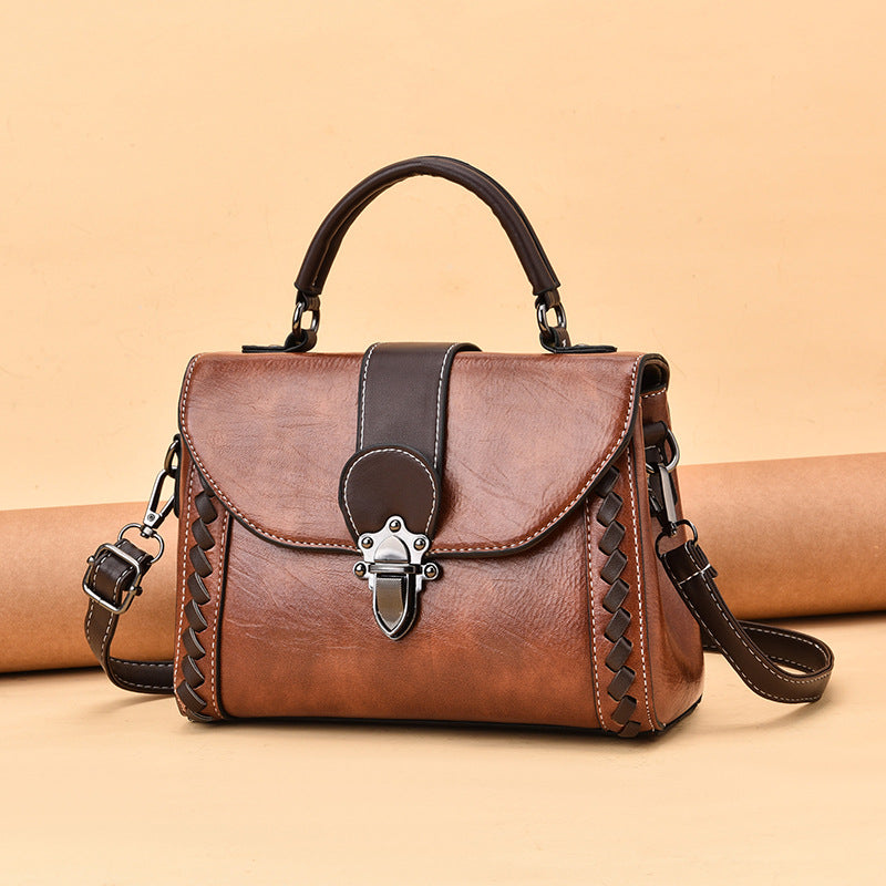 The lady is carrying a crossbody bag.