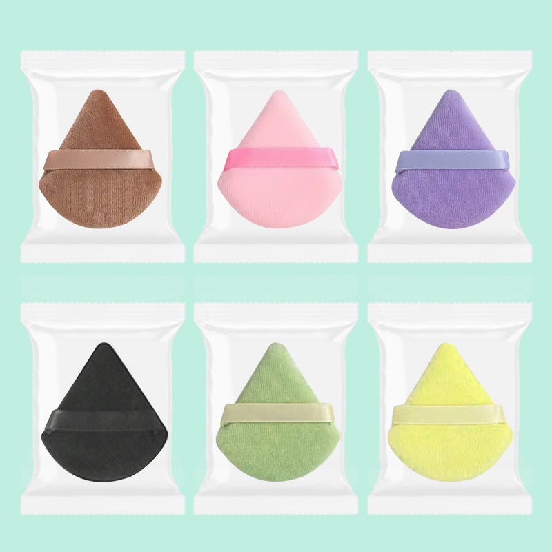 Triangular three-dimensional flocking air cushion puff
