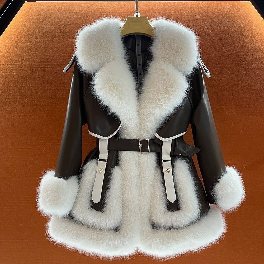 Women's mid-length fur coat with large fur collar and tie