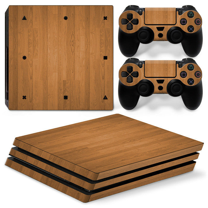 Gaming console and controllers with colorful abstract skin design on a white background Global swanky 6