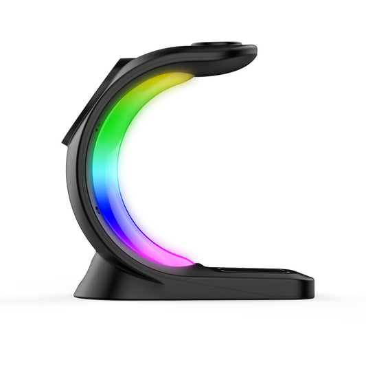 4-in-1 RGB magnetic wireless charger with smartphone, watch, and wireless earbuds on a wooden surface. Global swanky 5
