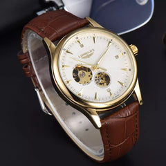 Gold case white dial