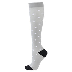 White dots on gray background
