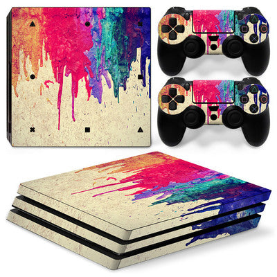 Gaming console and controllers with colorful abstract skin design on a white background Global swanky 1