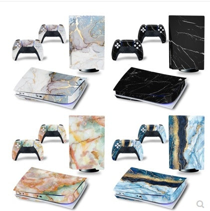 Gaming console and controllers with marble pattern skin on a white background global swanky 2