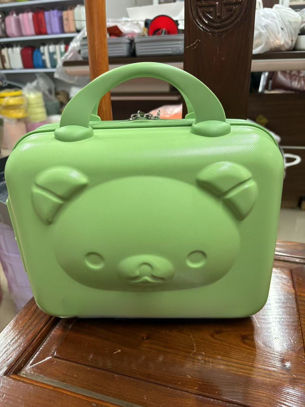 A 14-inch cosmetic case small suitcase