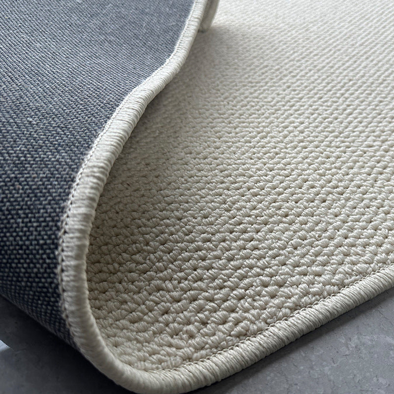 A balcony with a faux sisal off-white carpet