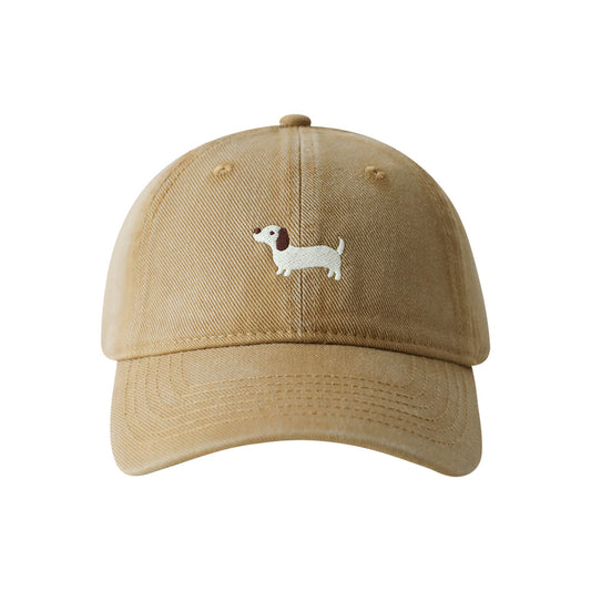 A baseball cap with cute cartoon dog embroidery