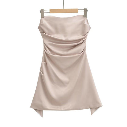A belted fishbone off-the-shoulder dress