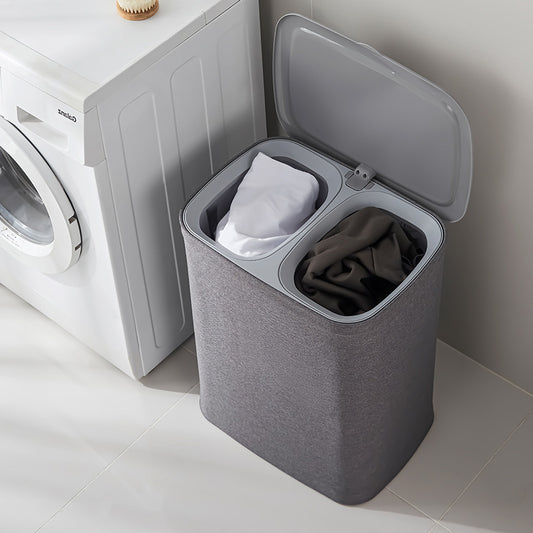 A covered dirty clothes basket