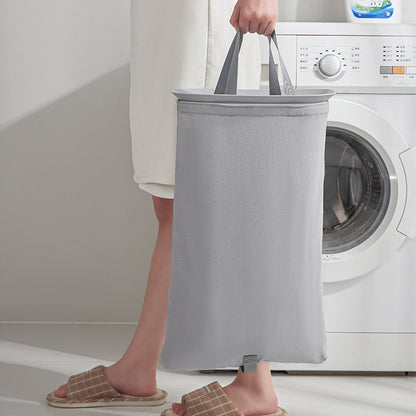 A covered dirty clothes basket