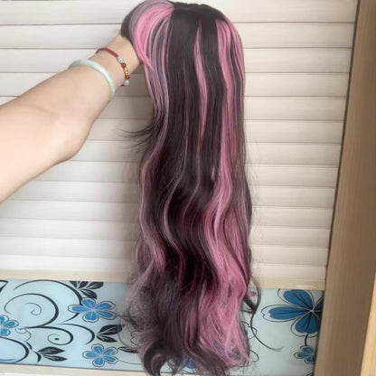 A female wig with pink and black highlights and long curly hair