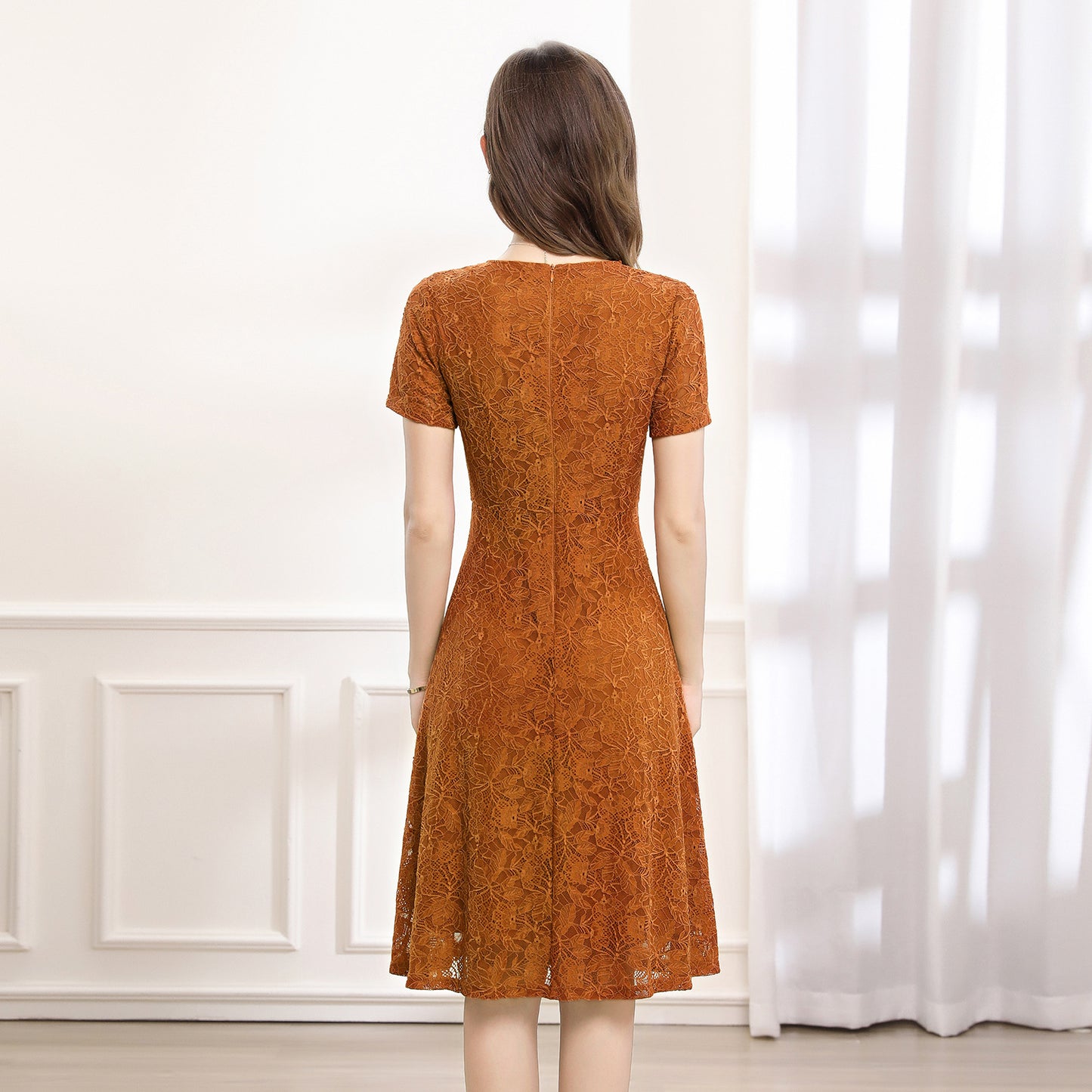 A figure-hugging lace dress