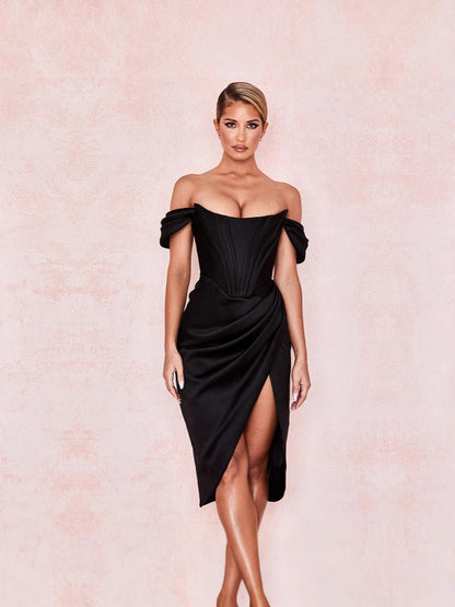 A figure-hugging, V-necked, elegant evening dress
