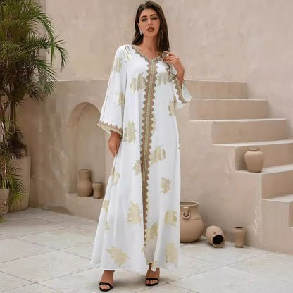 A golden-flowered Abaya robe