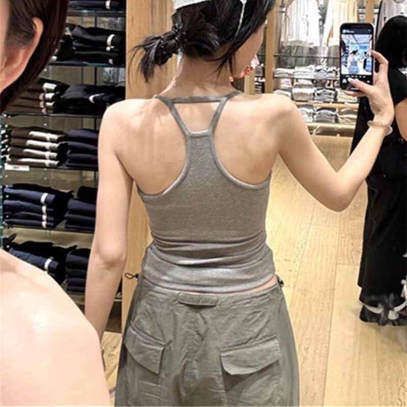 A halter-neck top with a chest cushion