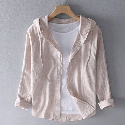 A hooded long-sleeved solid-color shirt