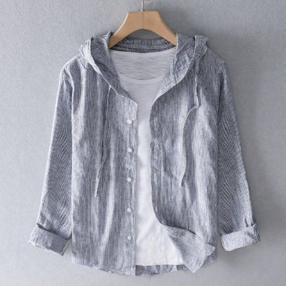 A hooded long-sleeved solid-color shirt