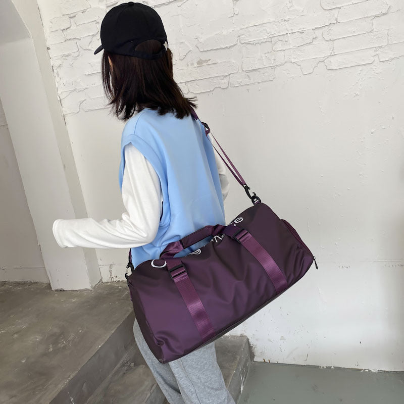 A large-capacity hand-held travel bag with a pull handle