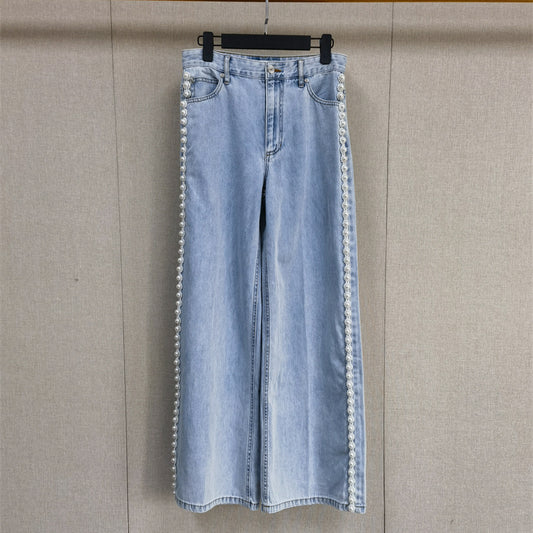 A light blue denim shirt and wide-leg pants suit