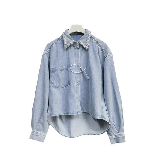 A light blue denim shirt and wide-leg pants suit