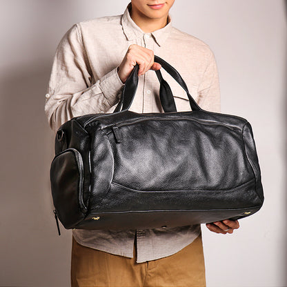 A new men's genuine leather hand-held travel bag with a handle