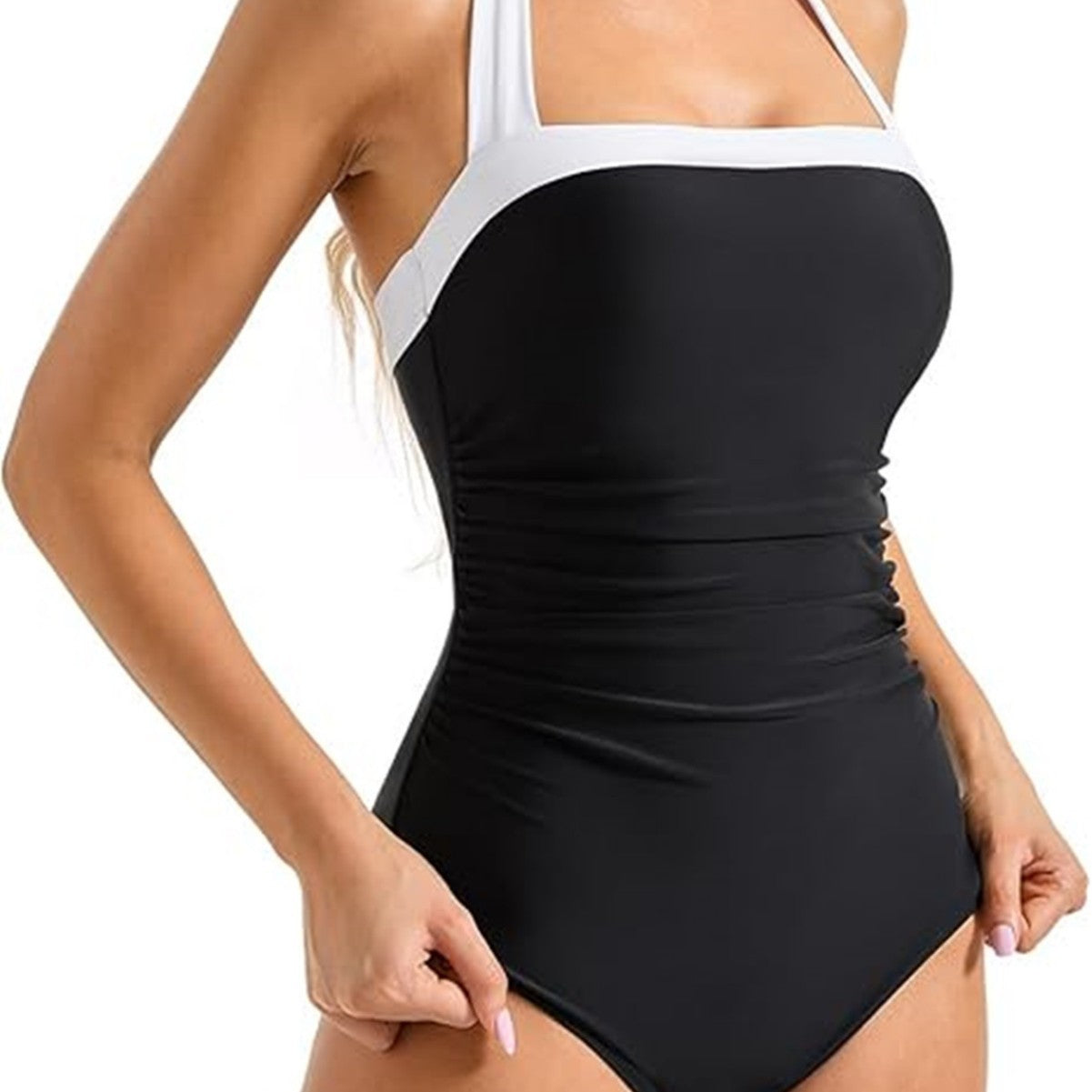 A one-piece swimsuit with a cinched belly and a halter top