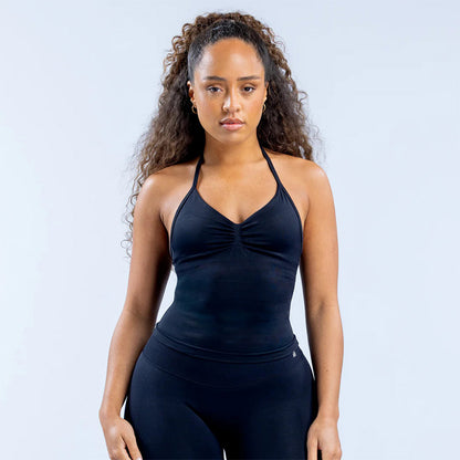 A one-piece yoga vest with a chest cushion for a beautiful back