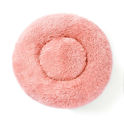 A plush round pet bed