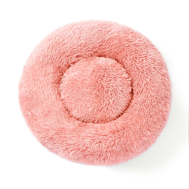 A plush round pet bed
