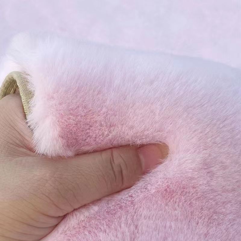 A rabbit-shaped plush coffee table mat