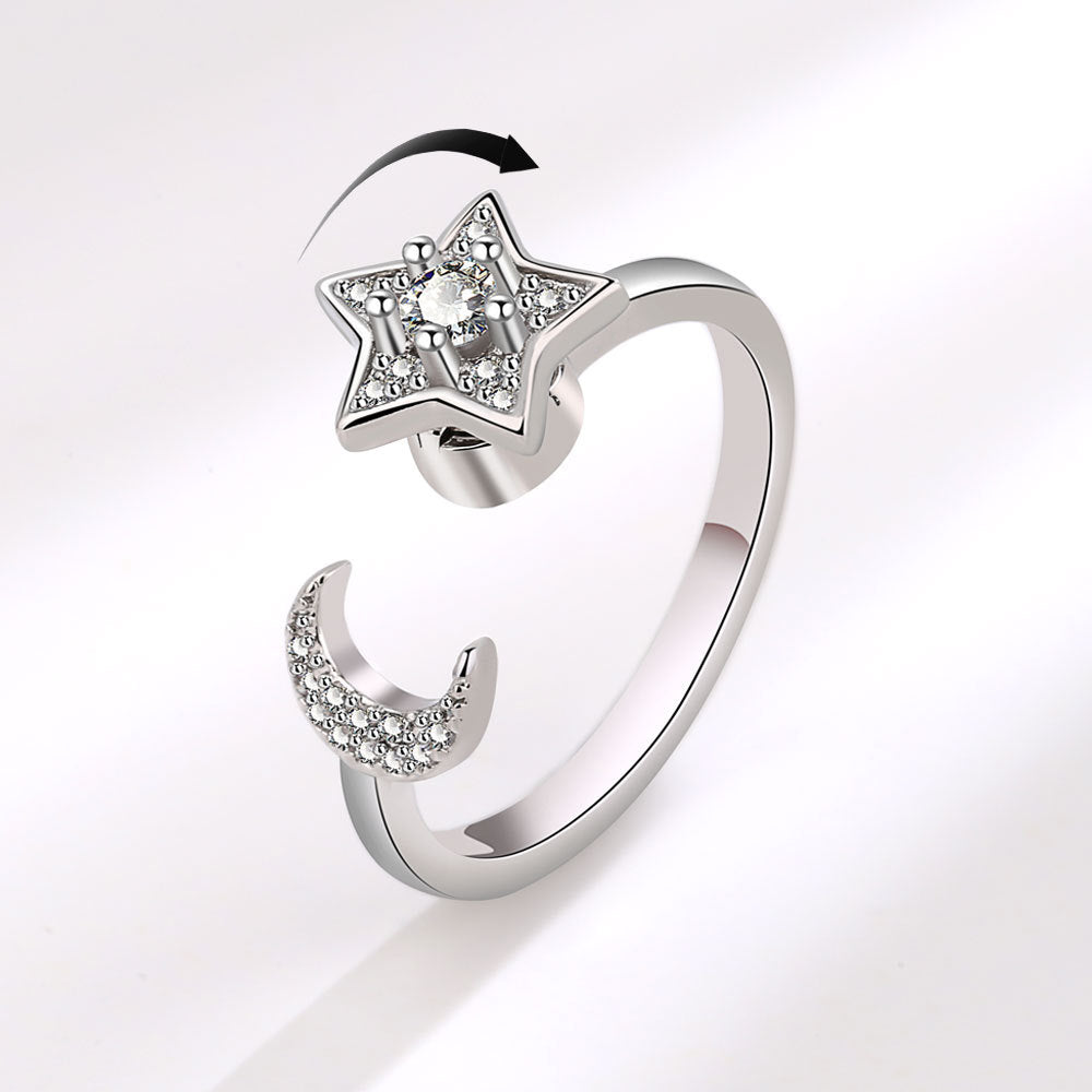 A rotating ring with stars and the moon shining together