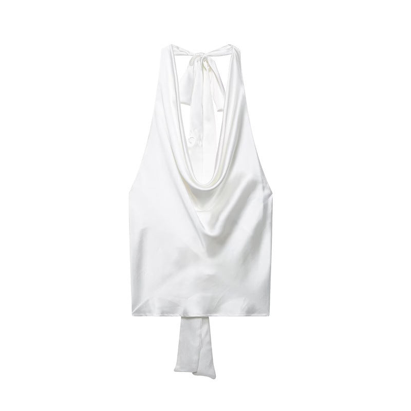 A silk satin-textured top hung around the neck