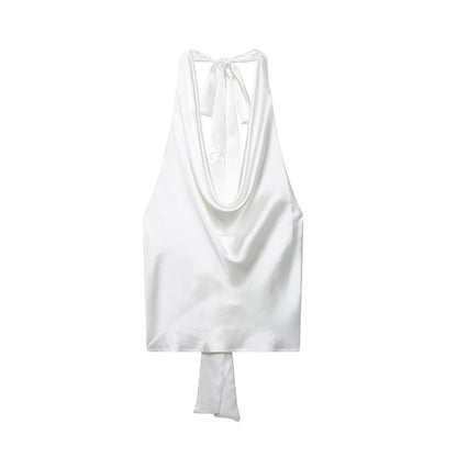 A silk satin-textured top hung around the neck