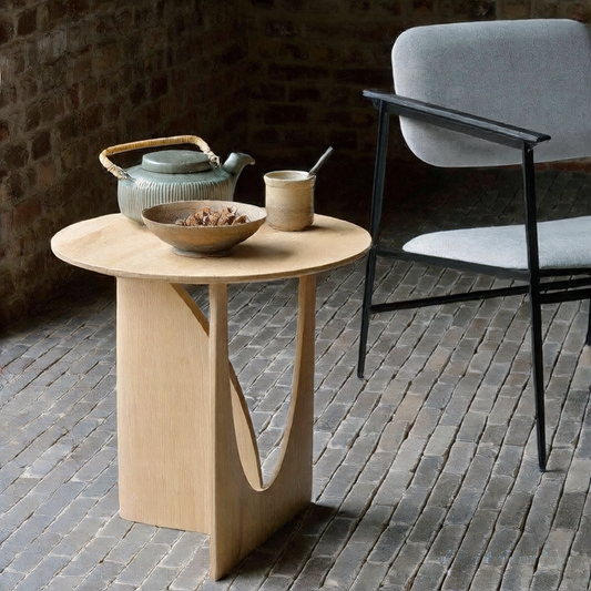 A simple round solid wood coffee table