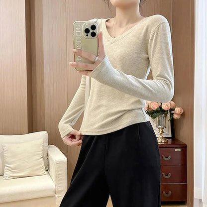 A simple straight-shoulder V-neck base layer top