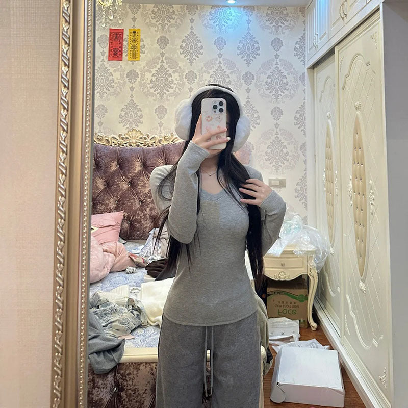 A simple straight-shoulder V-neck base layer top